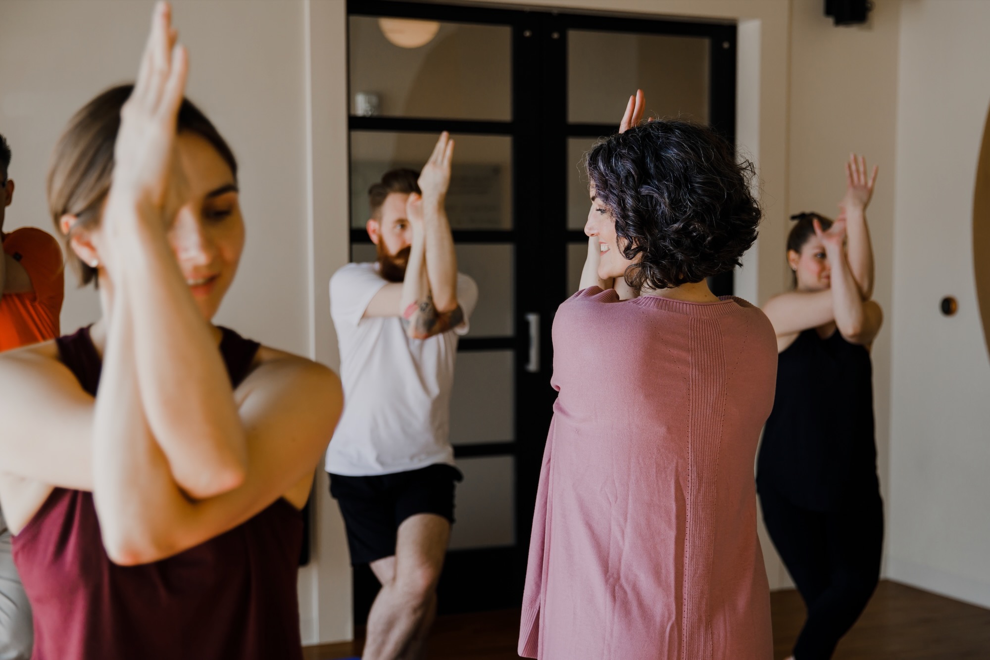 Class in eagle pose